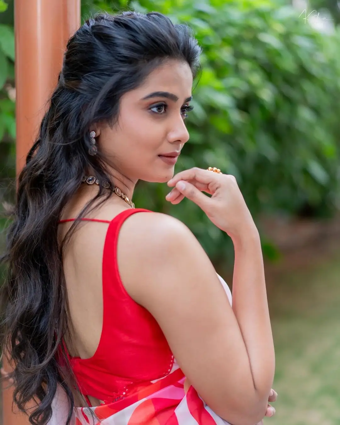 Indian Actress Gouri Priya Photoshoot in Red Saree Sleeveless Blouse